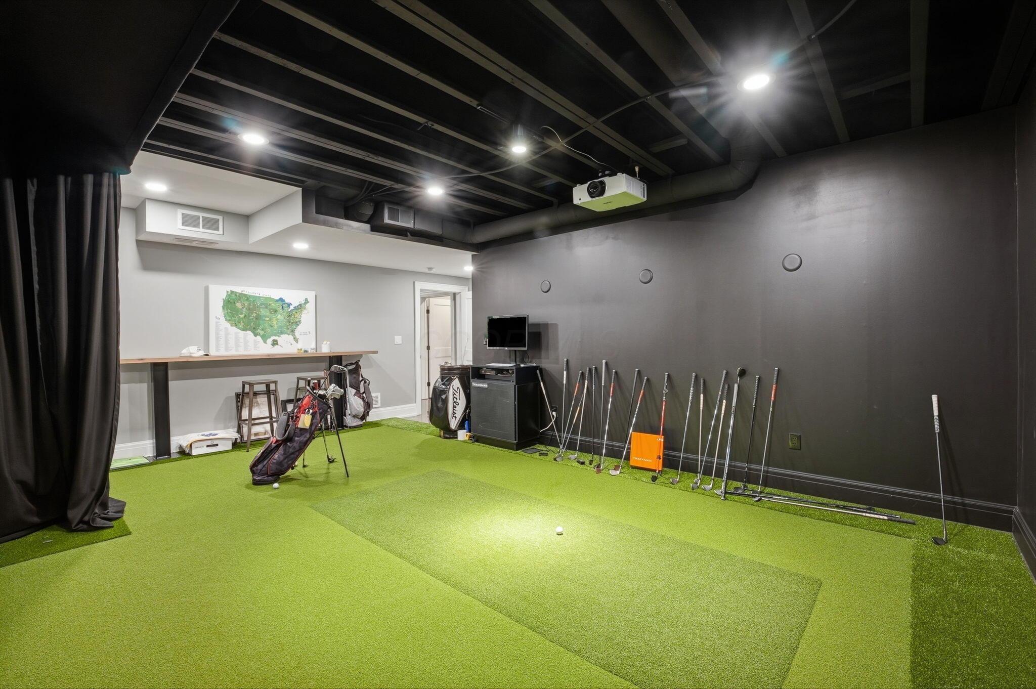 10122 Concord Road Dublin, OH 43017 - Photo 81 of 119 Lower Level Golf Simulator