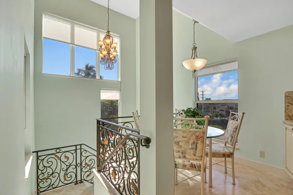 a view of a dining room with furniture