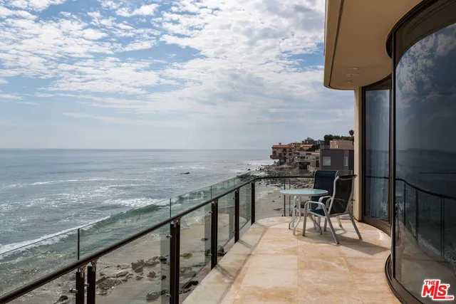 a view of ocean from a balcony