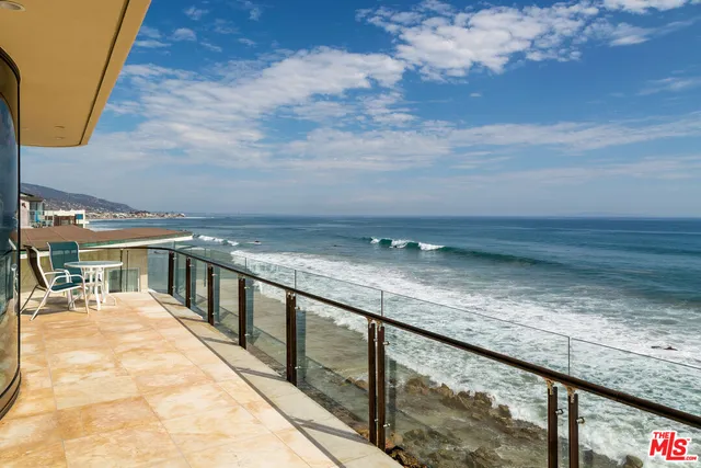 a view of swimming pool with outdoor seating