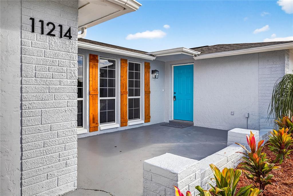11214 Kapok Avenue Port Richey, FL 34668 - Photo 4 of 25 a view of front door of house
