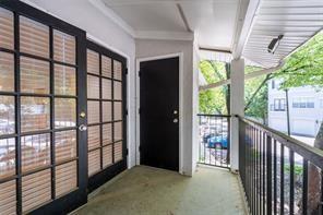 1150 Collier Road Northwest, Unit 6H Atlanta, GA 30318 - Photo 10 of 29 a view of a porch