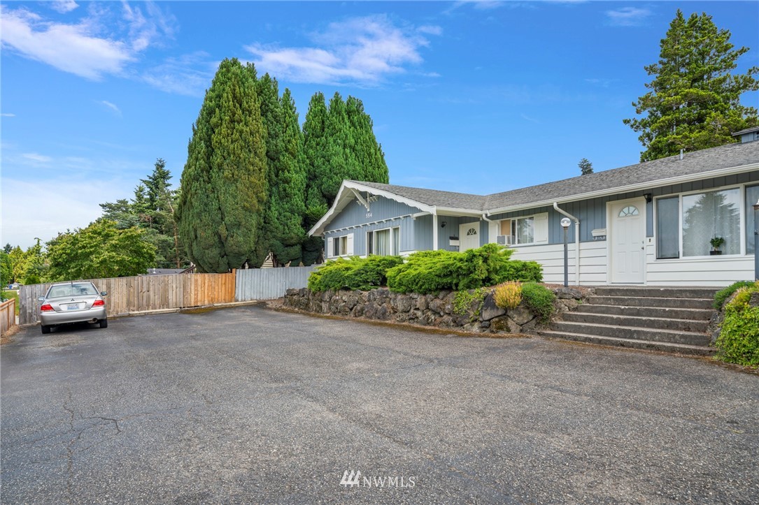 554 Index Place Northeast Renton, WA 98056 - Photo 11 of 17 a view of a house with a patio and a yard