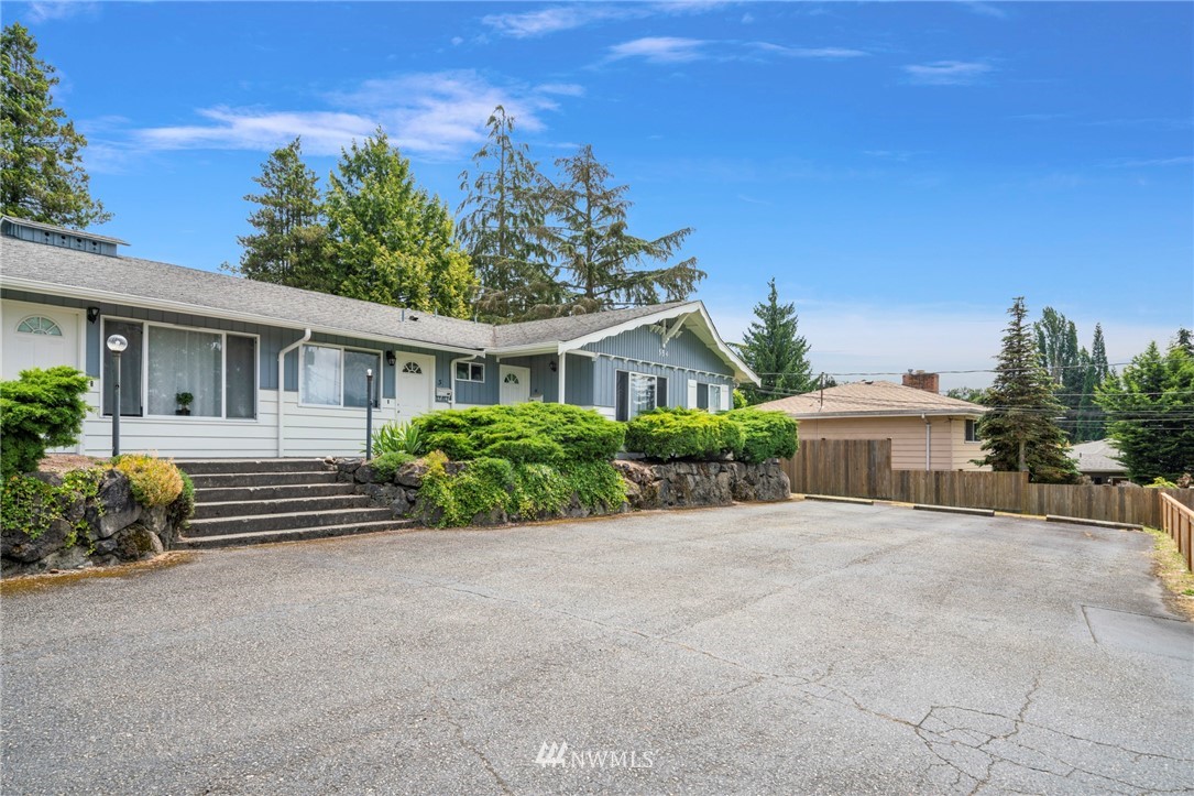554 Index Place Northeast Renton, WA 98056 - Photo 10 of 17 front view of a house with a yard