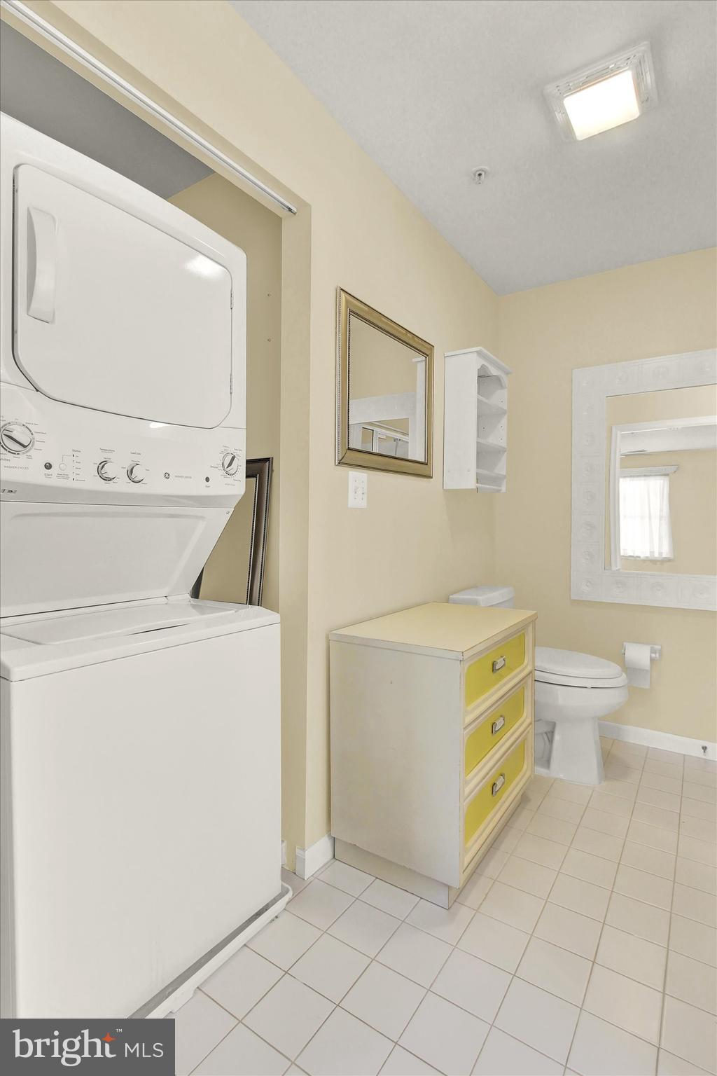 6500 Ridenour Way East, Unit 3C Sykesville, MD 21784 - Photo 11 of 22 a utility room with dryer and washer