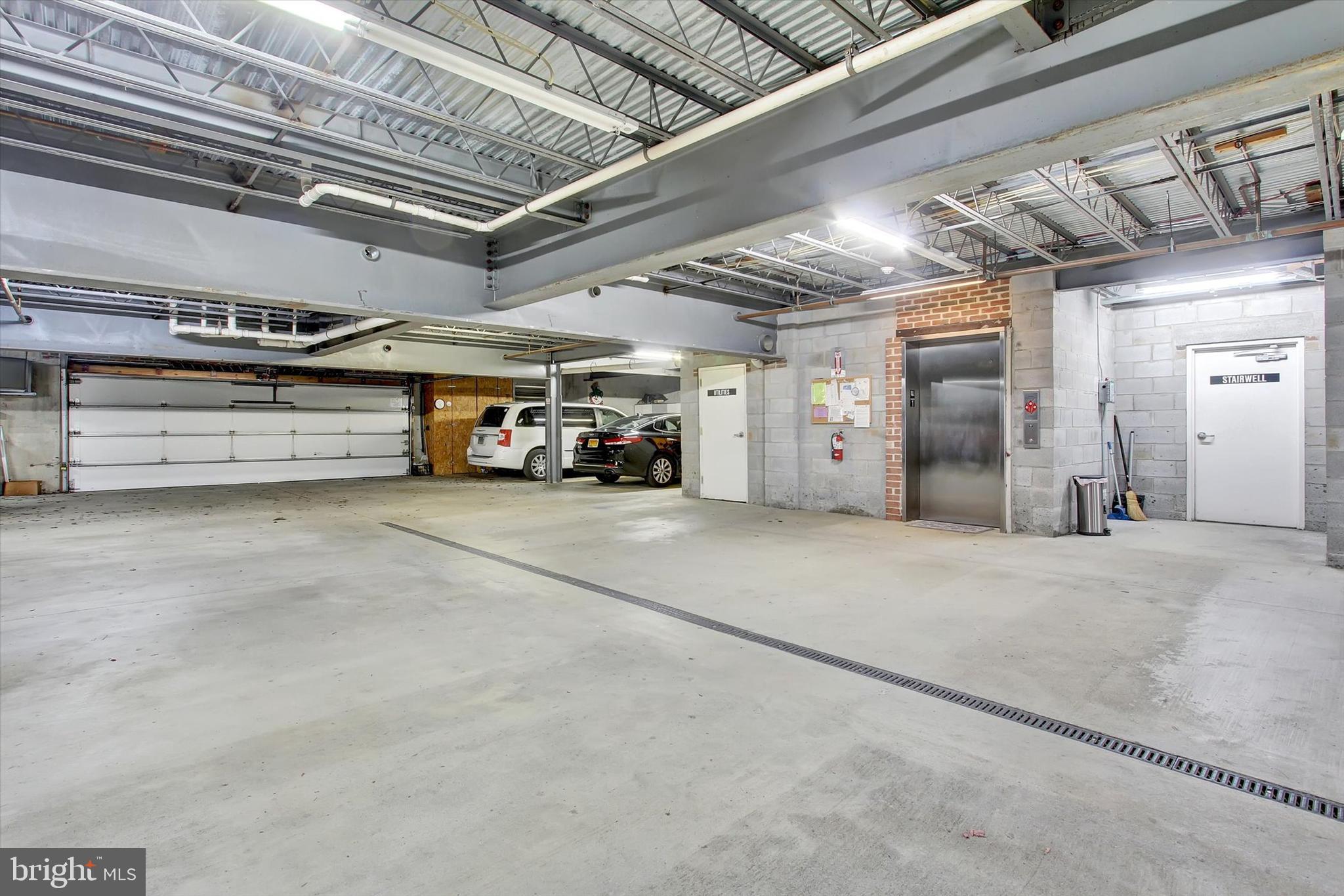 6500 Ridenour Way East, Unit 3C Sykesville, MD 21784 - Photo 19 of 22 a view of parking garage with cars