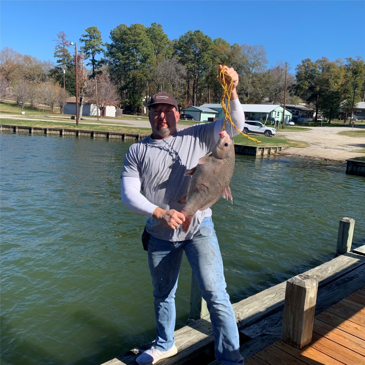 Tbd Apple Tree Livingston, TX 77351 - Photo 6 of 9 a view of a lake with boats in front of house