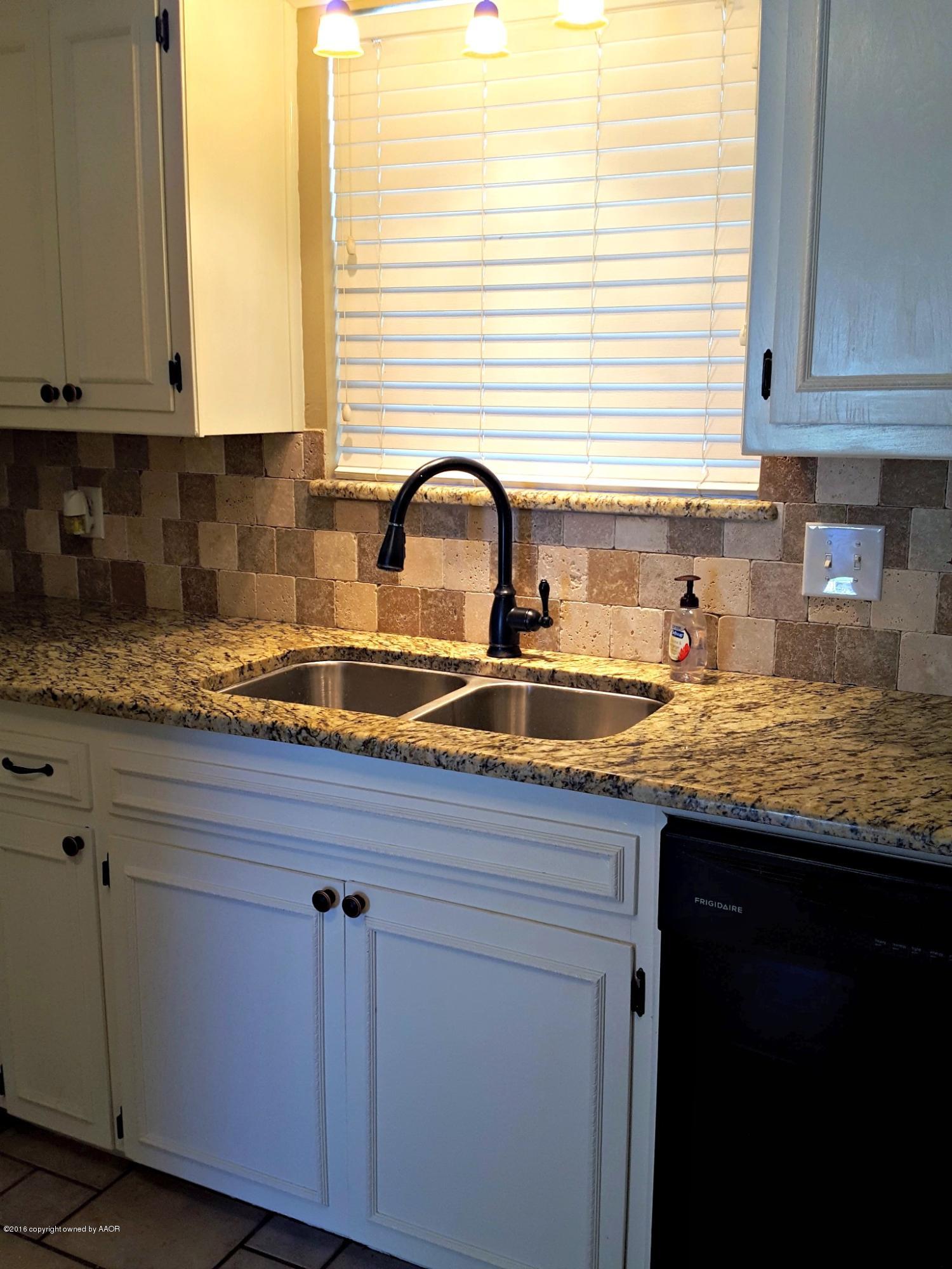 8612 Valleyview Drive Amarillo, TX 79110 - Photo 8 of 30 Kitchen travertine tile
