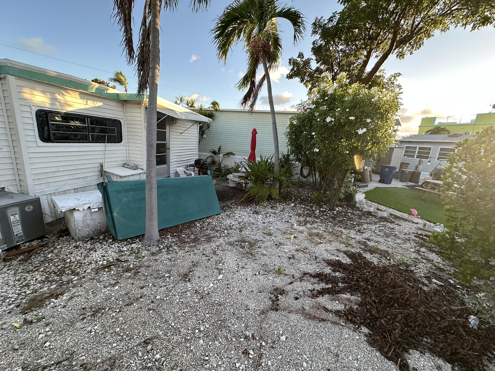 65821 Overseas Highway, Unit 310 Long Key, FL 33001 - Photo 26 of 32 a view of a backyard with potted plants