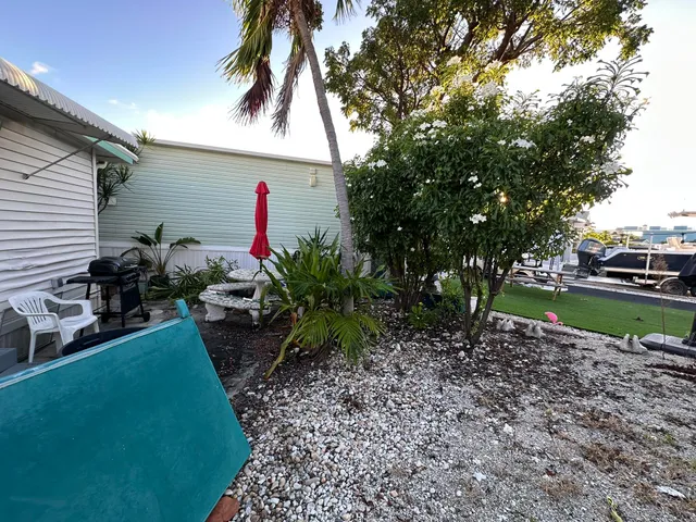 a childrens park with lots of swings and slides