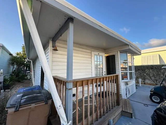 a view of a porch with furniture