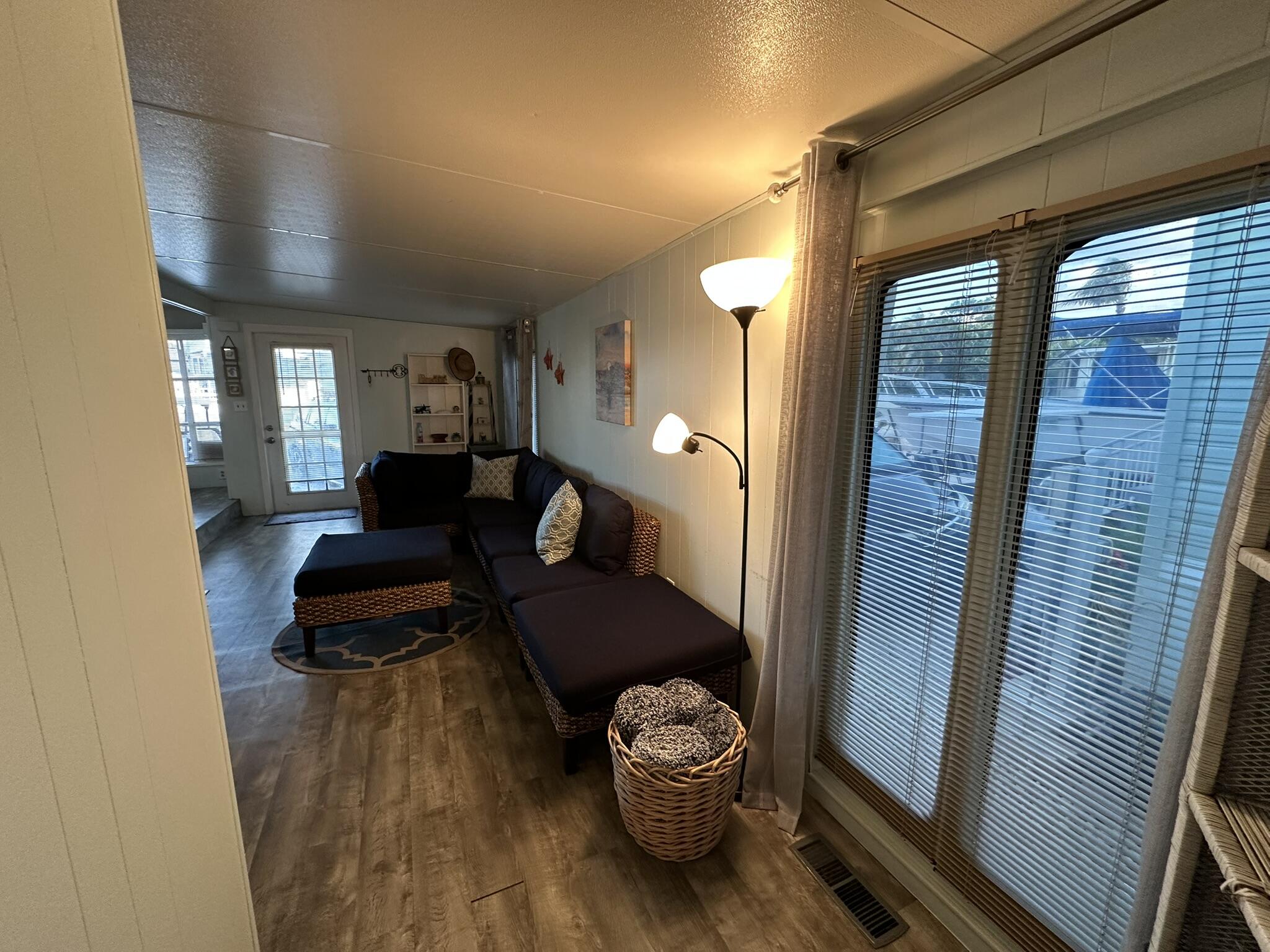 65821 Overseas Highway, Unit 310 Long Key, FL 33001 - Photo 7 of 32 a living room with furniture and a large window