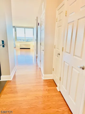 a kitchen with stainless steel appliances granite countertop a refrigerator and a stove