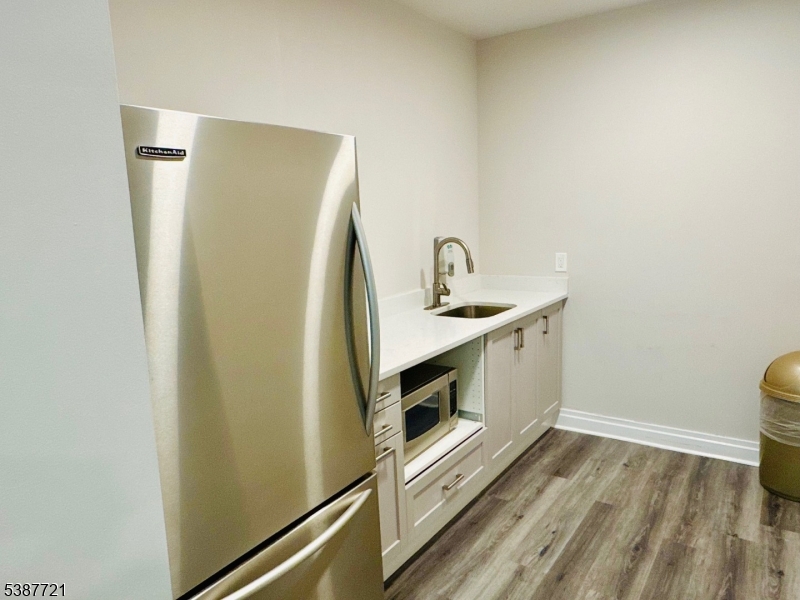 1806 One Spring Street, Unit 1806 New Brunswick, NJ 08901 - Photo 46 of 49 a utility room with dryer and washer