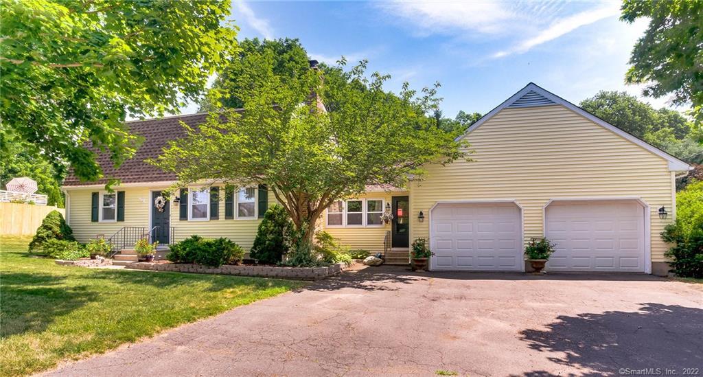 241 Sperry Road Bristol, CT 06010 - Photo 1 of 1 a front view of house with yard and trees around