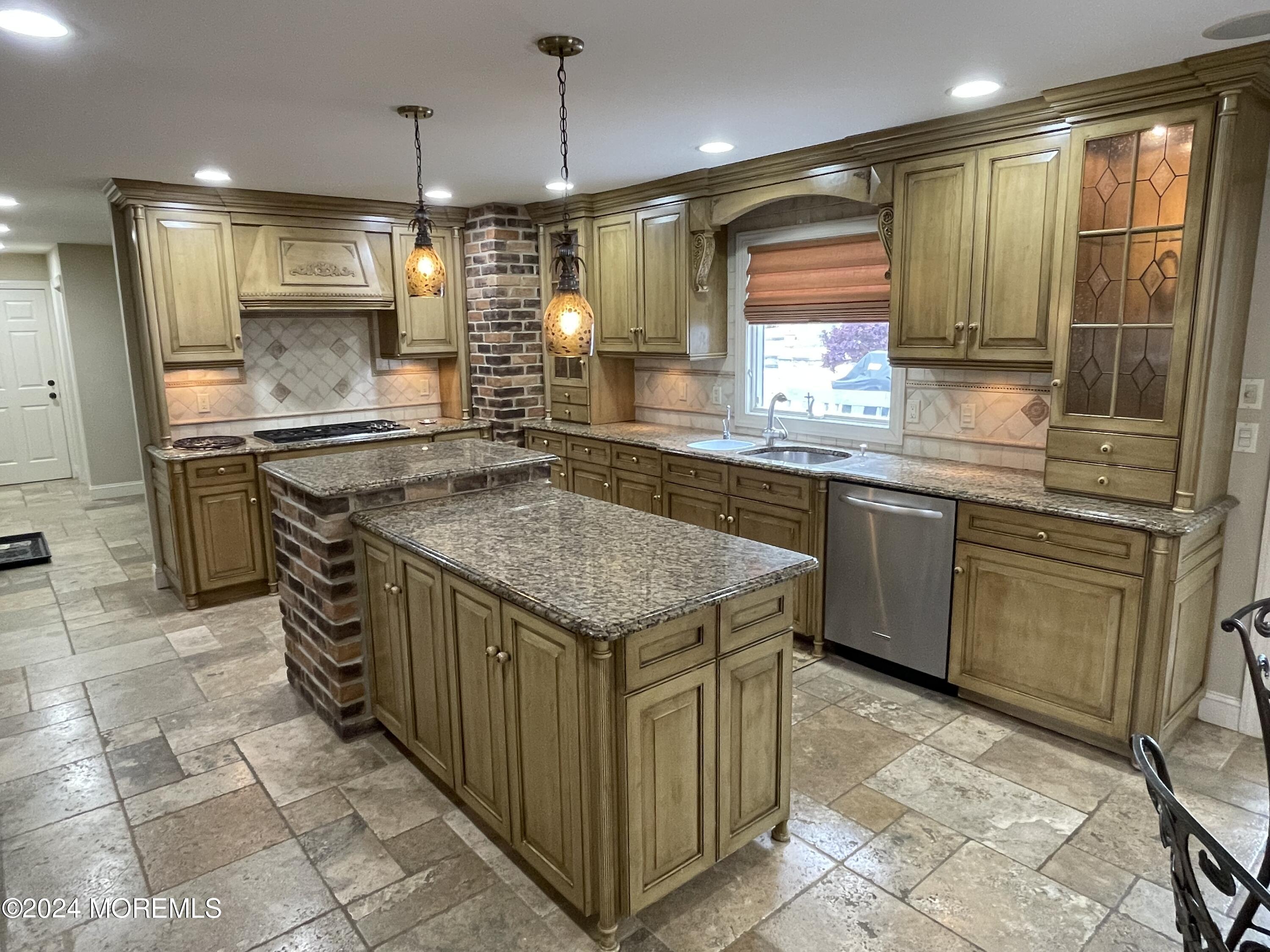 1 Longstreet Road Manalapan, NJ 07726 - Photo 11 of 76 a kitchen with stainless steel appliances granite countertop a sink and a refrigerator