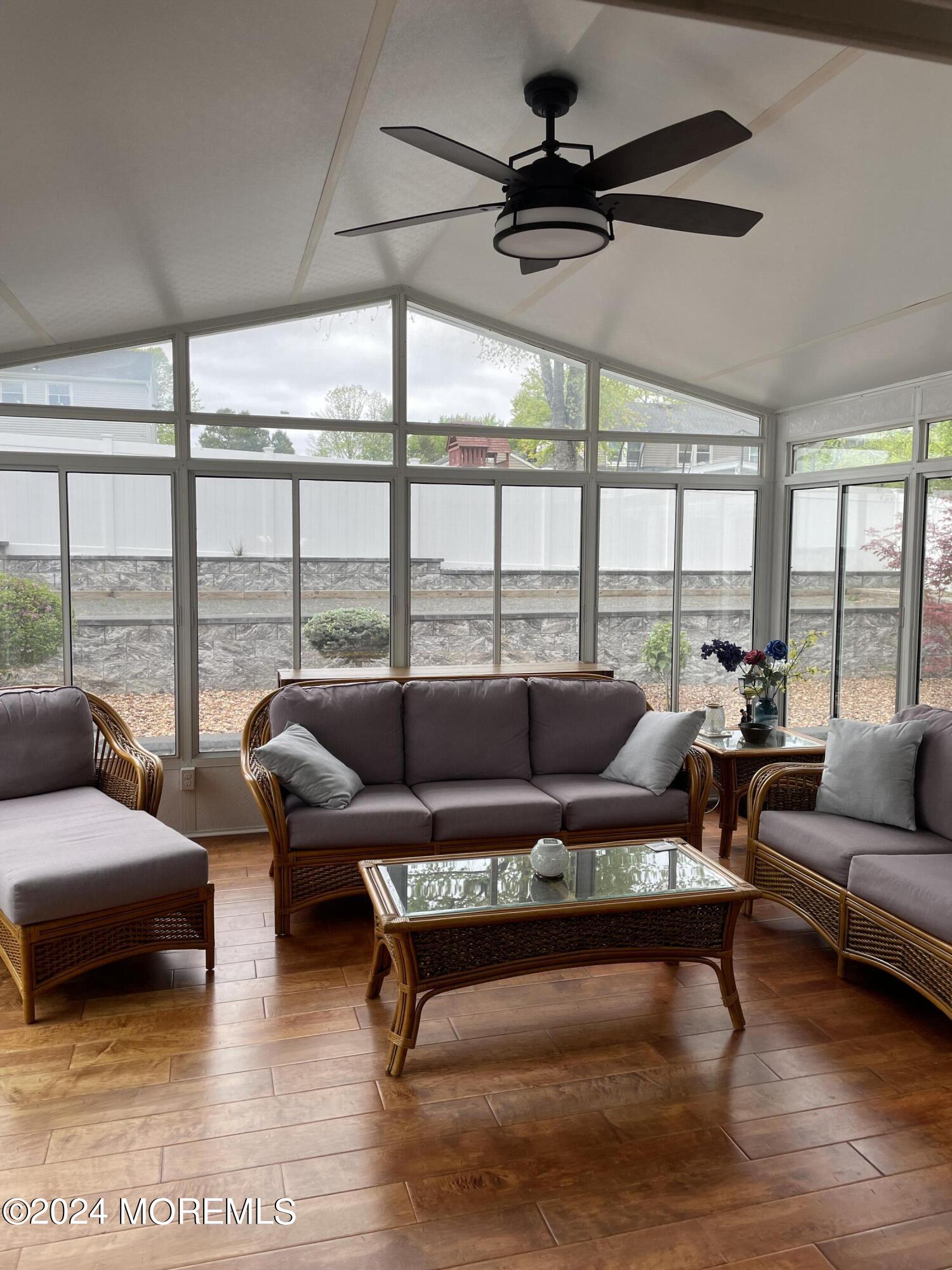 1 Longstreet Road Manalapan, NJ 07726 - Photo 24 of 76 a living room with furniture and a large window