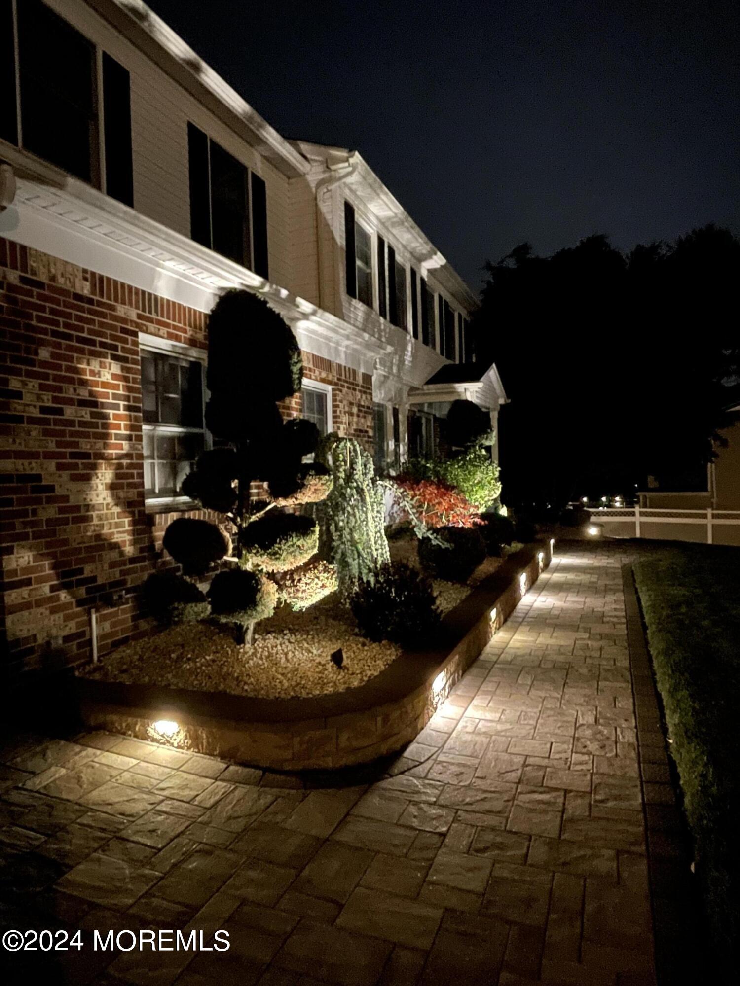1 Longstreet Road Manalapan, NJ 07726 - Photo 4 of 76 a view of a house with yard and patio