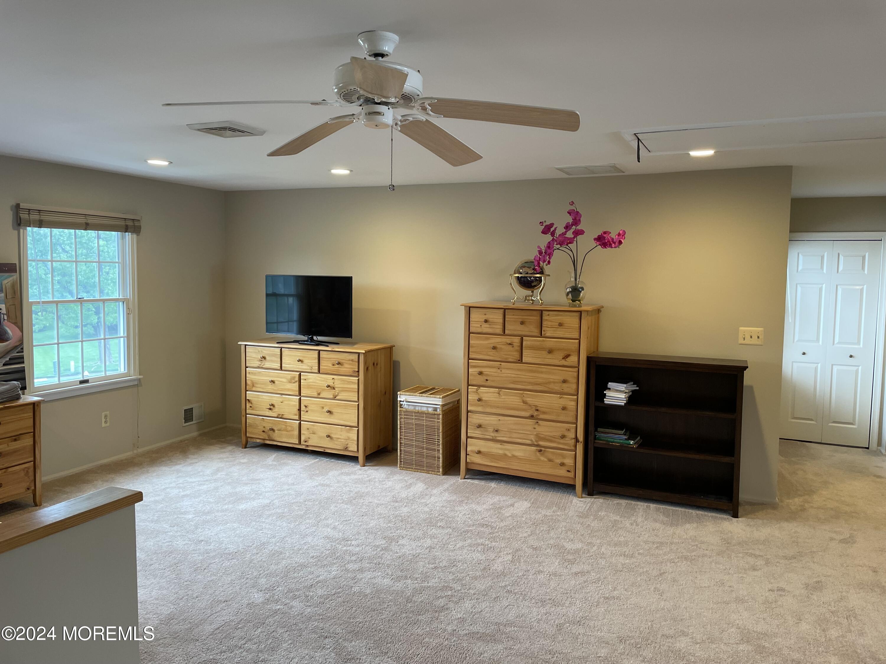 1 Longstreet Road Manalapan, NJ 07726 - Photo 50 of 76 a view of a livingroom with furniture