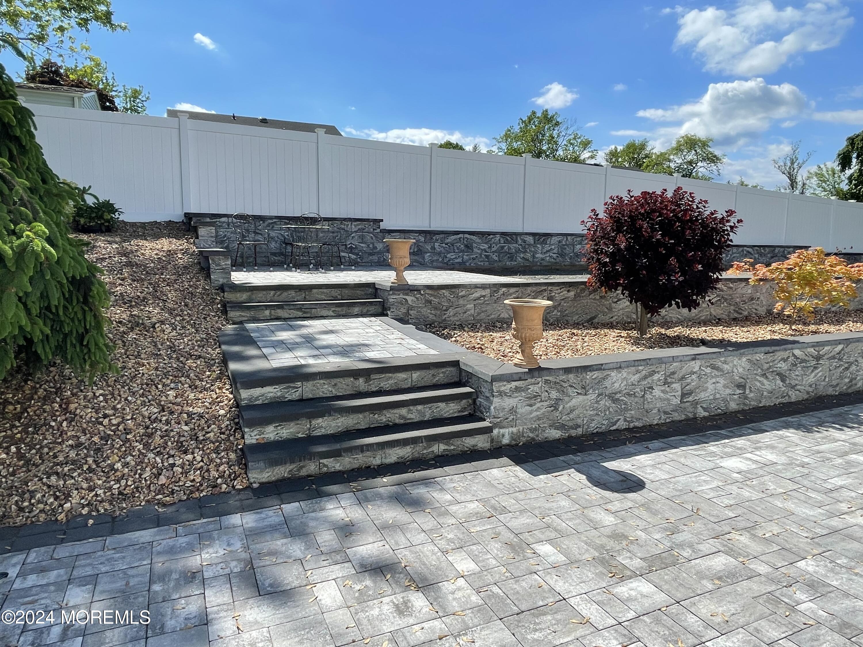 1 Longstreet Road Manalapan, NJ 07726 - Photo 69 of 76 a view of a entryway door front of house