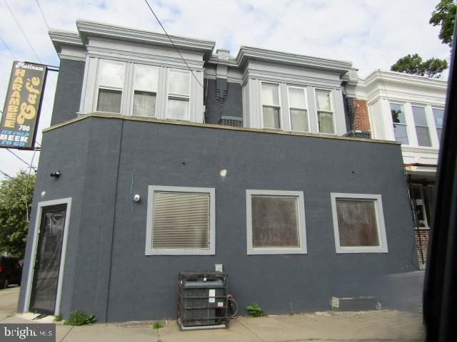 700 Lloyd Street Chester, PA 19013 - Photo 1 of 32 a front view of a house with many windows