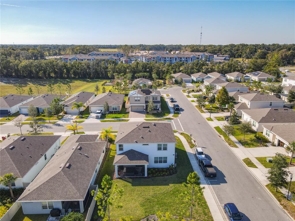 2248 Canopy Terrace Boulevard DeLand, FL 32724 - Photo 37 of 49 an aerial view of residential houses with outdoor space