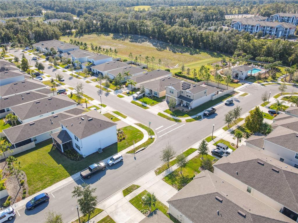 2248 Canopy Terrace Boulevard DeLand, FL 32724 - Photo 43 of 49 an aerial view of a house with a swimming pool and outdoor space