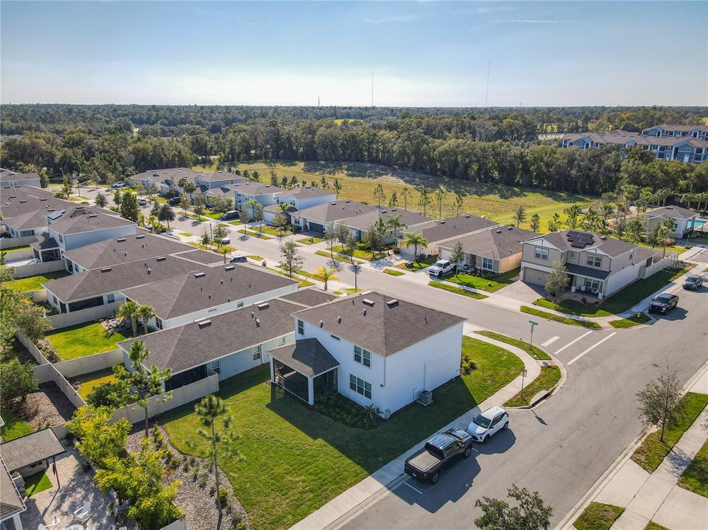 2248 Canopy Terrace Boulevard DeLand, FL 32724 - Photo 44 of 49 an aerial view of a house with yard swimming pool and lake view