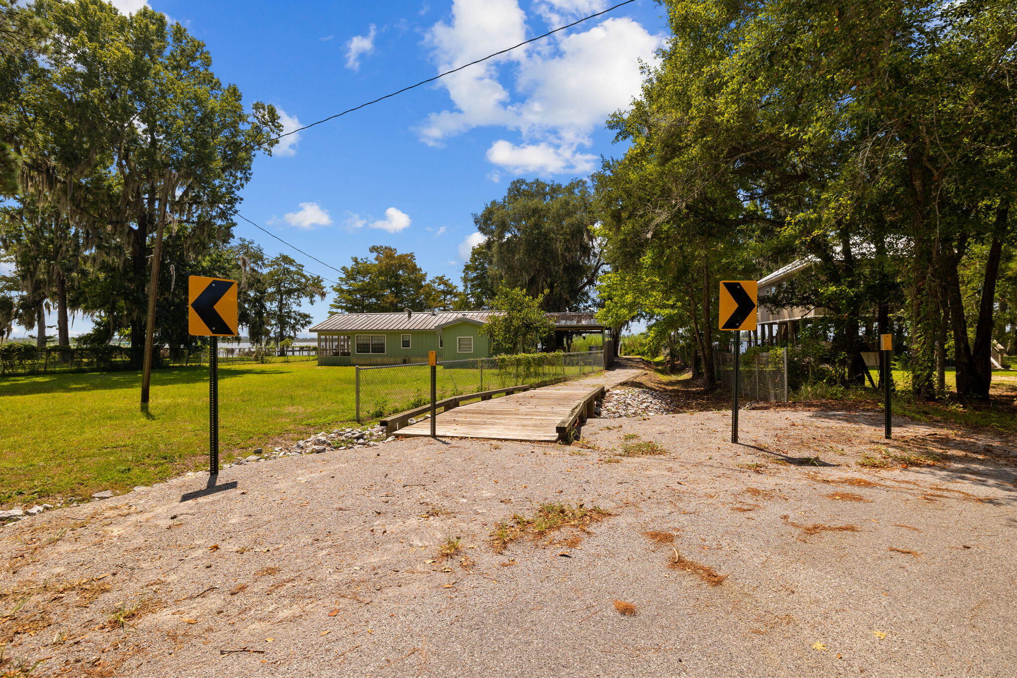 Tbd Shady Lane Freeport, FL 32439 - Photo 44 of 45 a view of a park with swings and slides