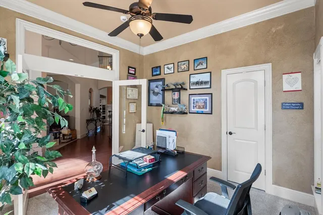 a view of a workspace with furniture