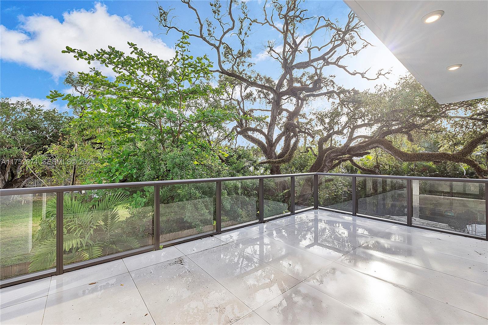 3664 Oak Avenue Miami, FL 33133 - Photo 20 of 39 a view of yard with a large tree