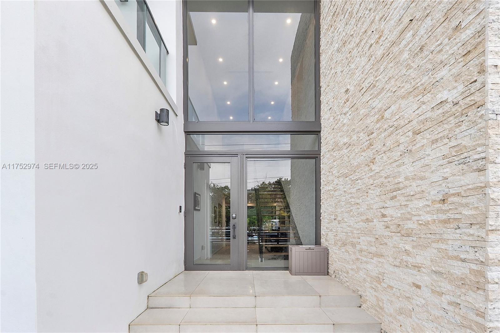 3664 Oak Avenue Miami, FL 33133 - Photo 3 of 39 a view of entryway and kitchen