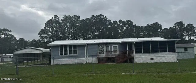a house view with a garden space