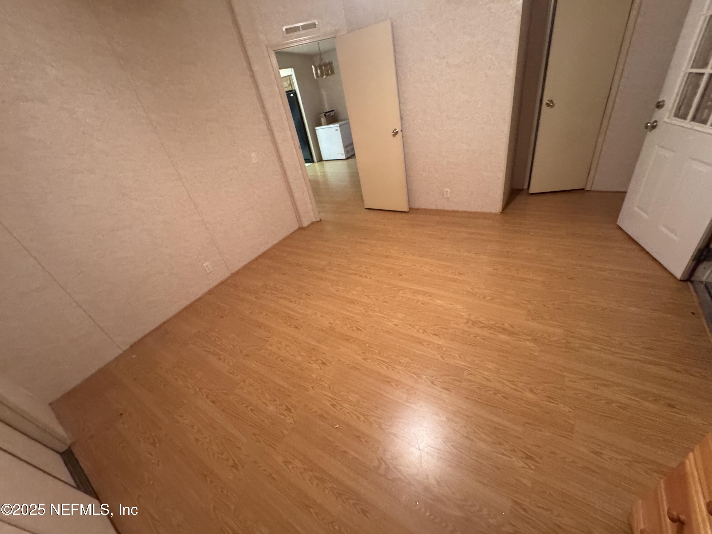 115 Edgemere Drive Georgetown, FL 32139 - Photo 17 of 24 a view of a room with door