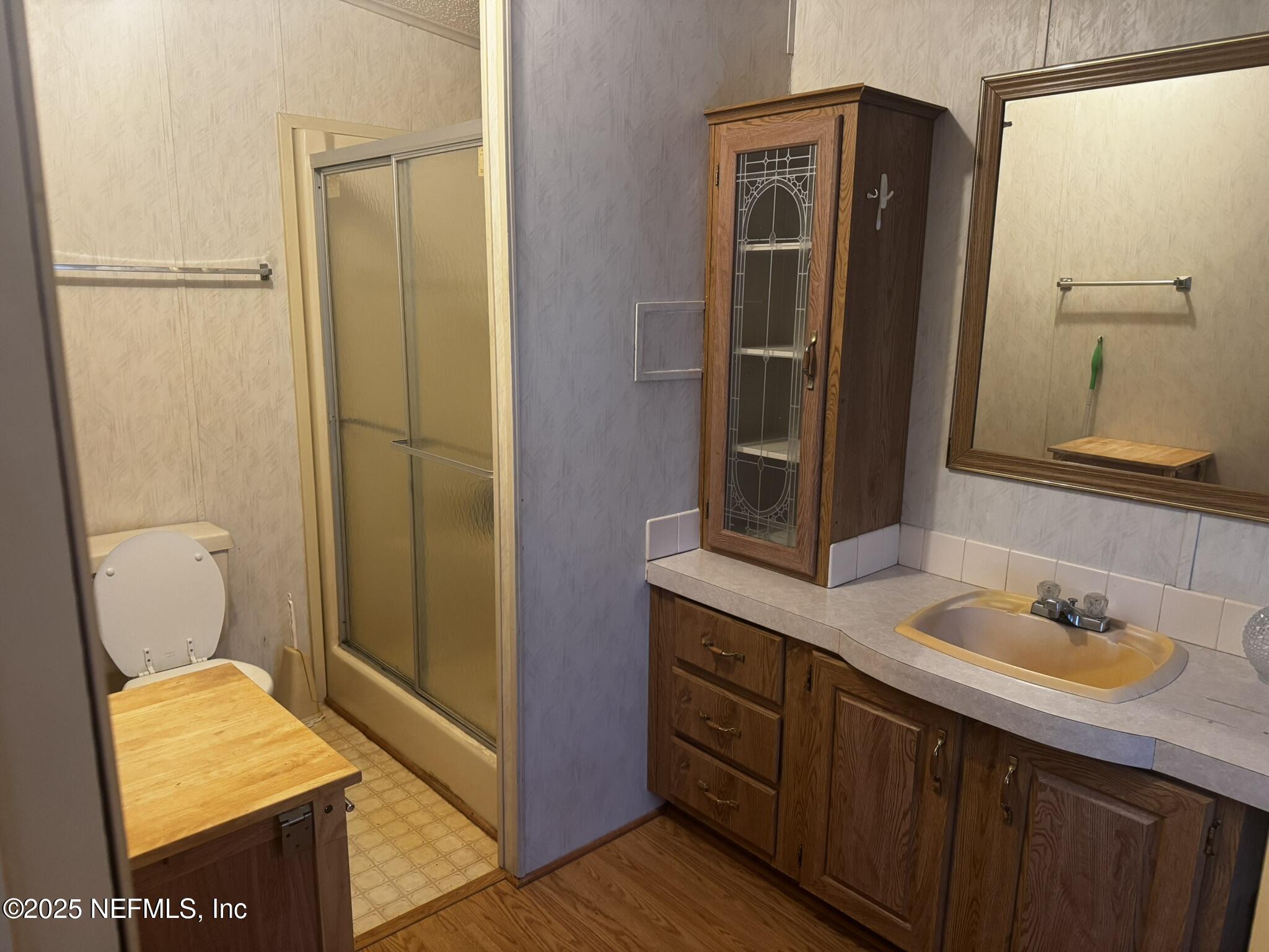 115 Edgemere Drive Georgetown, FL 32139 - Photo 20 of 24 a bathroom with a sink a toilet and shower