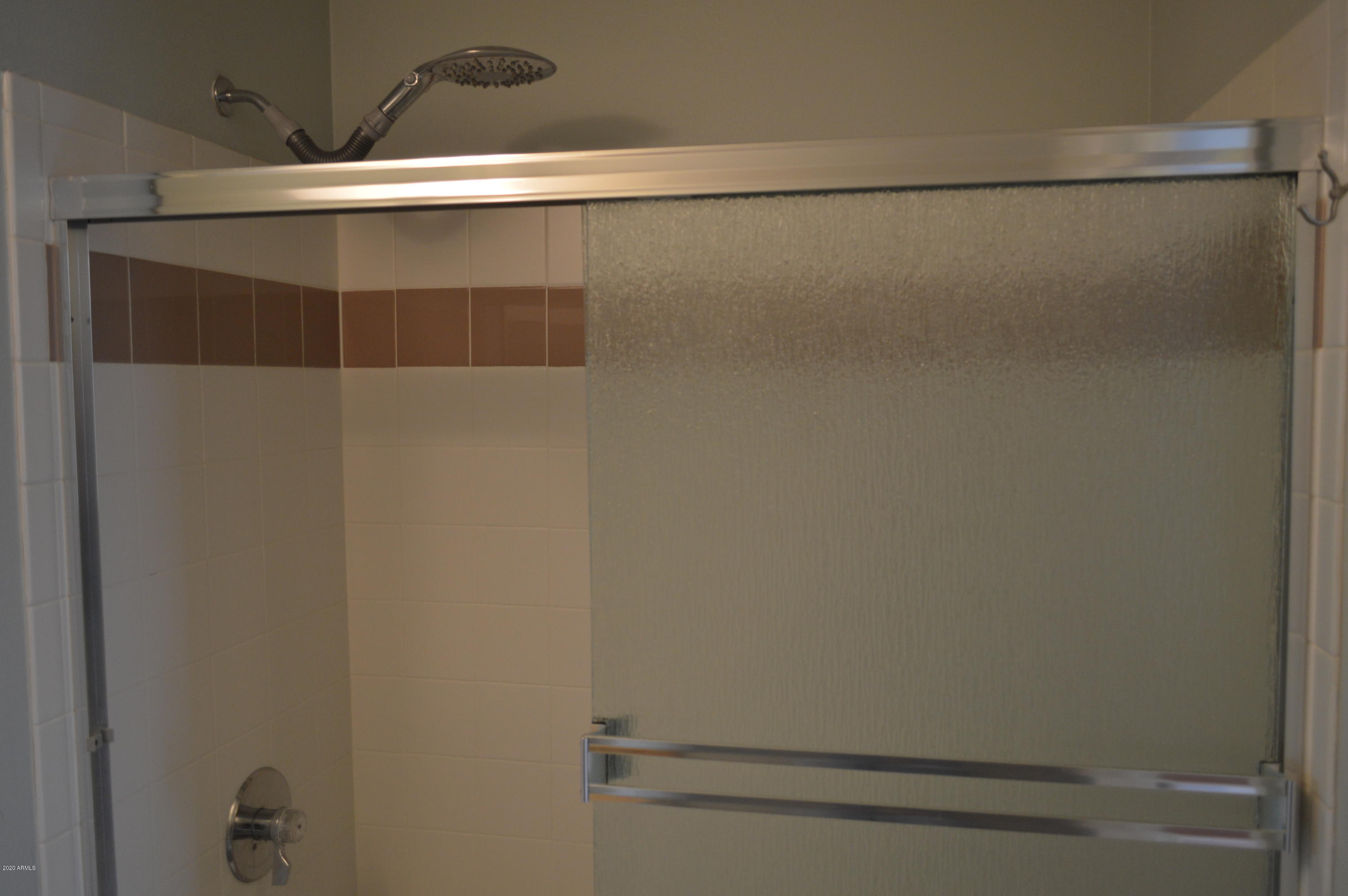 1701 East Colter Street, Unit 308 Phoenix, AZ 85016 - Photo 15 of 50 a bathroom with a shower