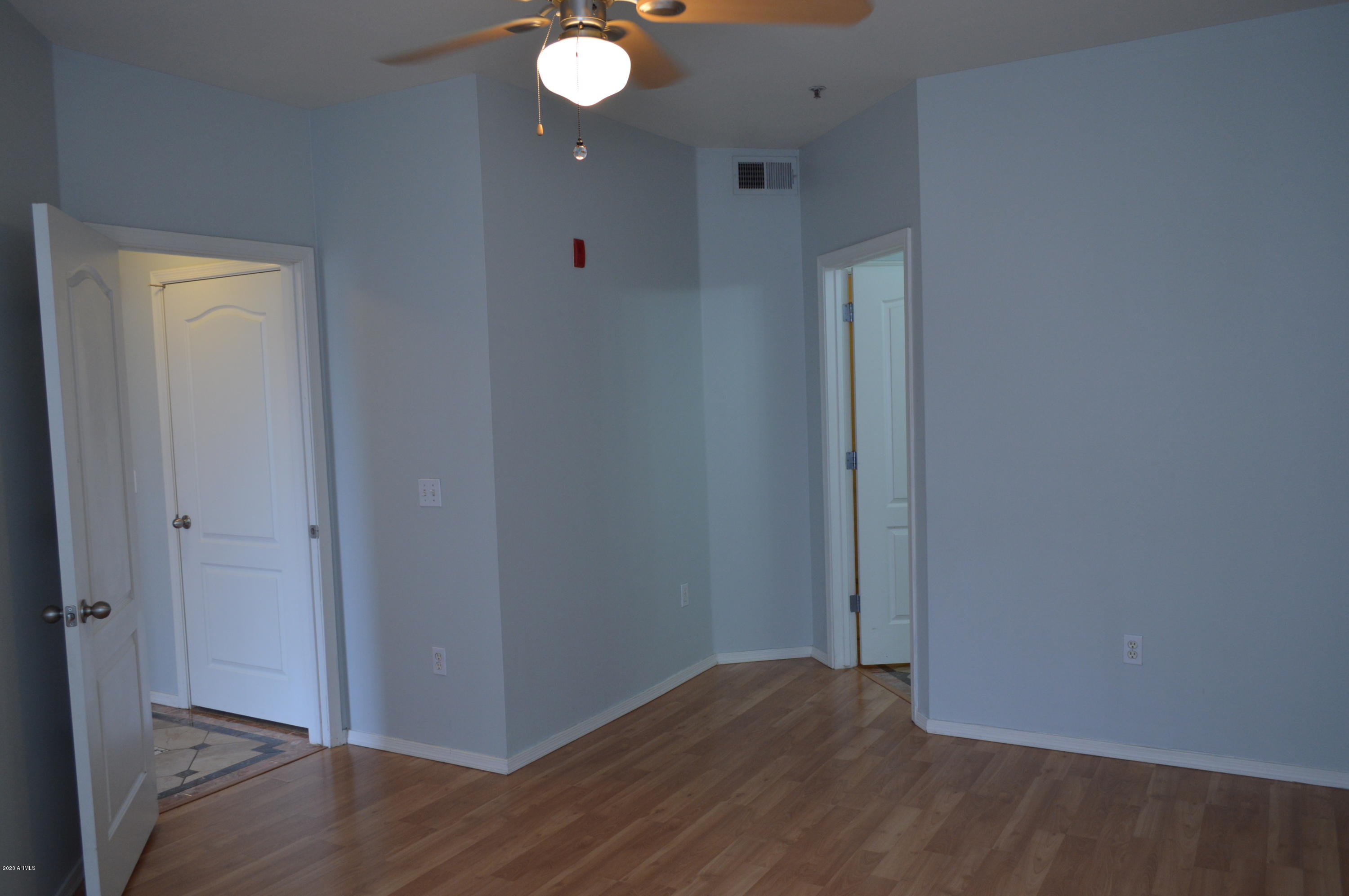 1701 East Colter Street, Unit 308 Phoenix, AZ 85016 - Photo 18 of 50 a view of hallway with wooden floor