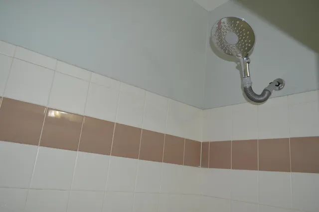 a view of a room with projector and racks