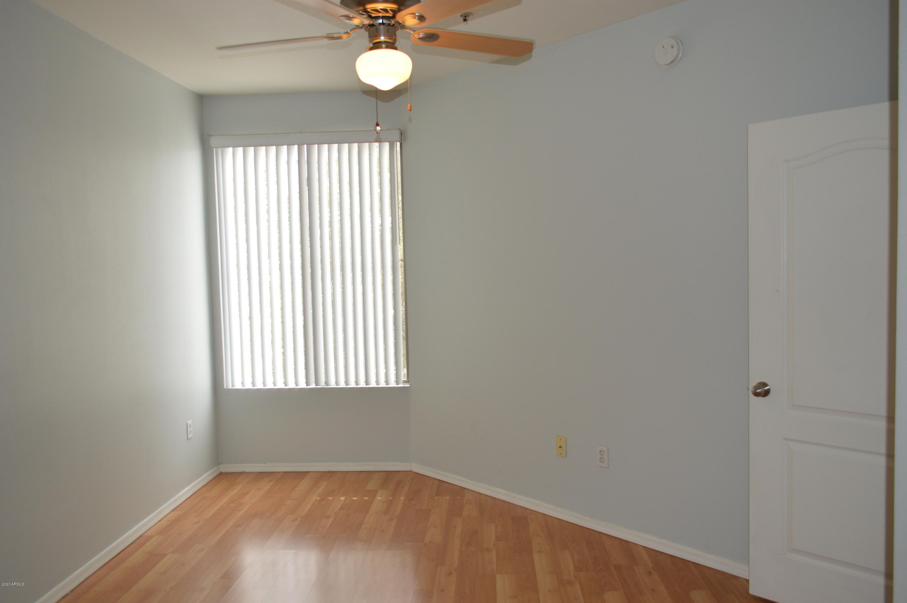 1701 East Colter Street, Unit 308 Phoenix, AZ 85016 - Photo 25 of 50 an empty room with a window