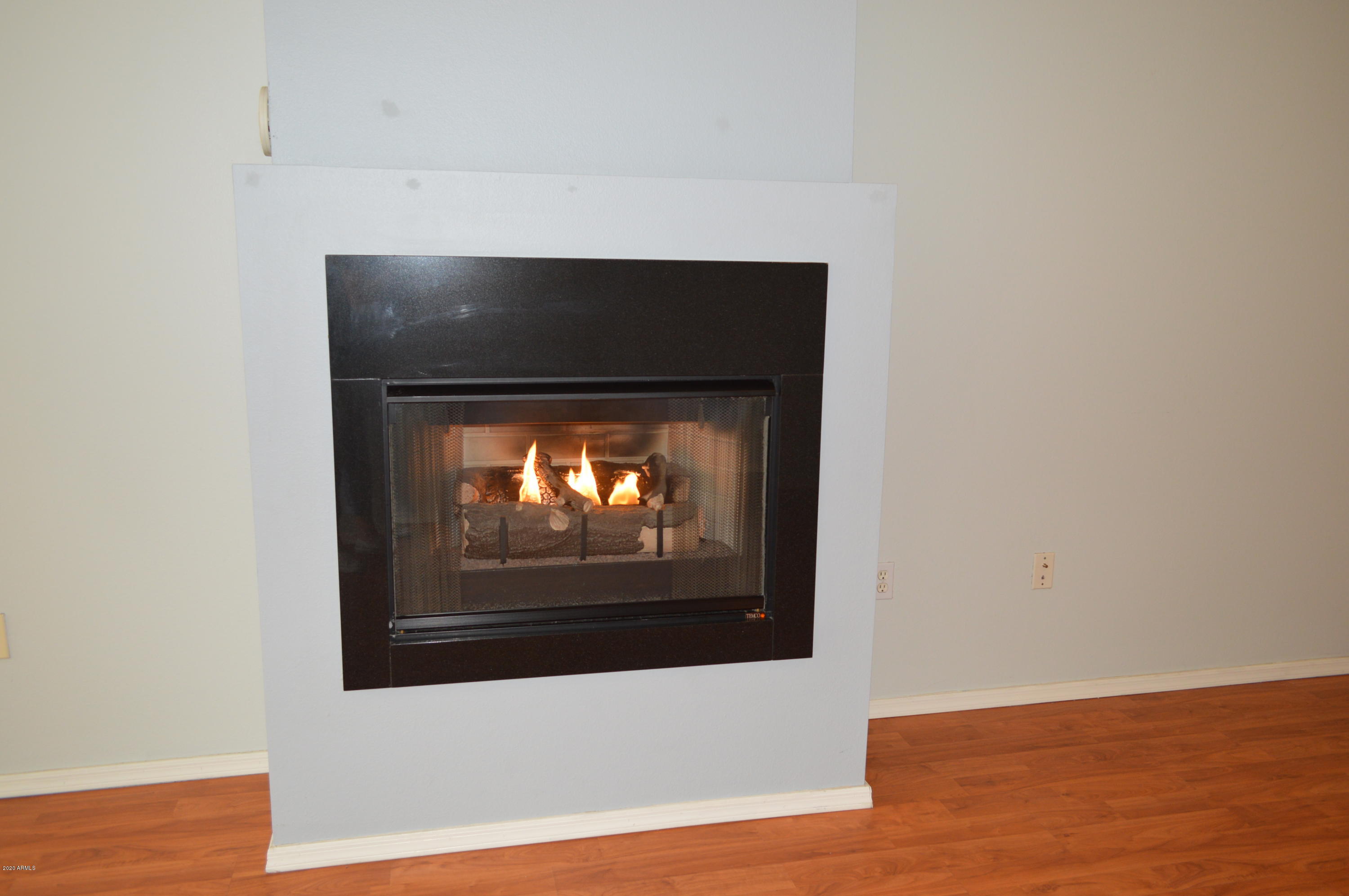 1701 East Colter Street, Unit 308 Phoenix, AZ 85016 - Photo 27 of 50 a view of a fireplace