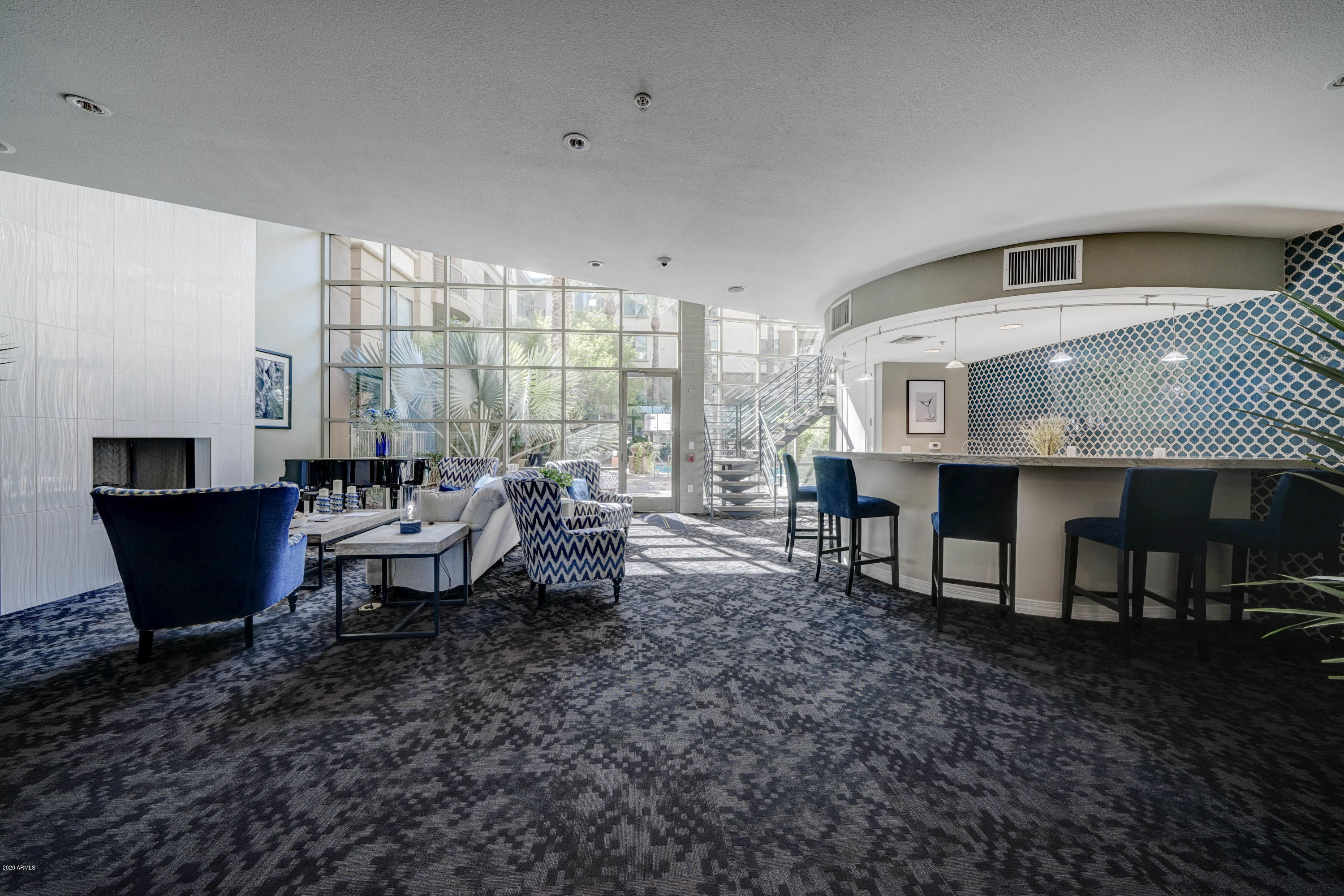 1701 East Colter Street, Unit 308 Phoenix, AZ 85016 - Photo 31 of 50 a living room with furniture two window and a table