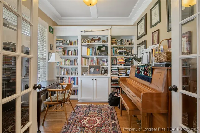 a room with furniture and a book shelf