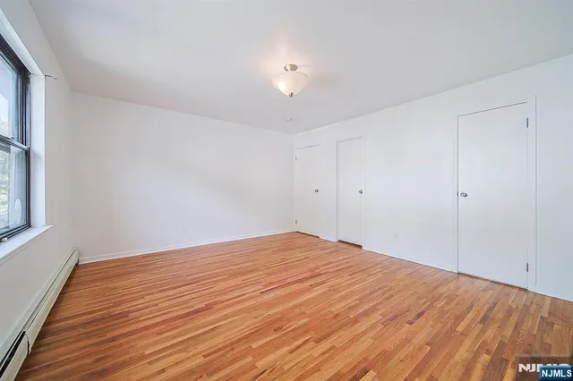 a bathroom with a sink a vanity and a mirror