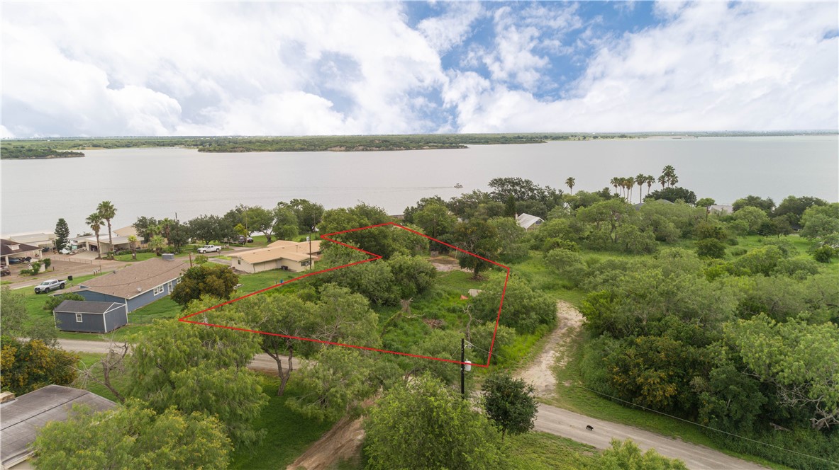 143 Trail Ridge Drive Sandia, TX 78383 - Photo 34 of 40 a view of a lake from a yard