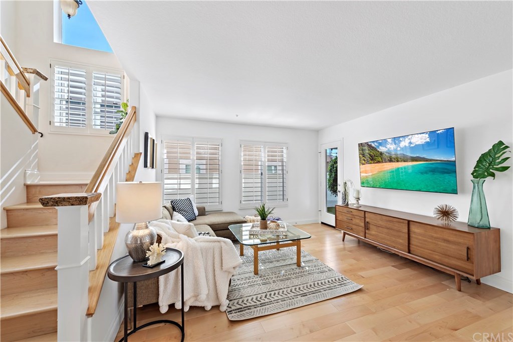 43 Cassis Dana Point, CA 92629 - Photo 13 of 41 a living room with furniture and a flat screen tv