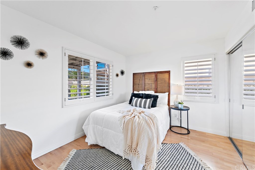 43 Cassis Dana Point, CA 92629 - Photo 14 of 41 a bedroom with a bed and a window with outer view