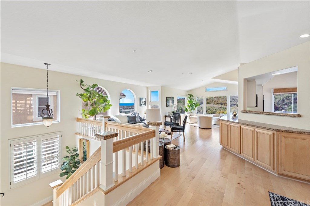 43 Cassis Dana Point, CA 92629 - Photo 3 of 41 a very nice looking living room with a large window and a wooden floor