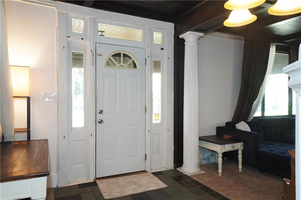 124 Hazel Street Kittanning, PA 16201 - Photo 6 of 26 a view of a livingroom with furniture and window