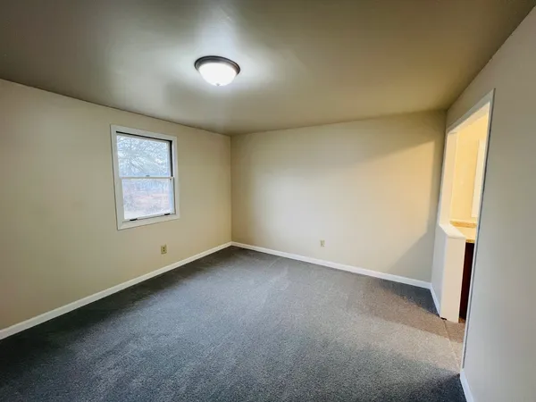 an empty room with a window