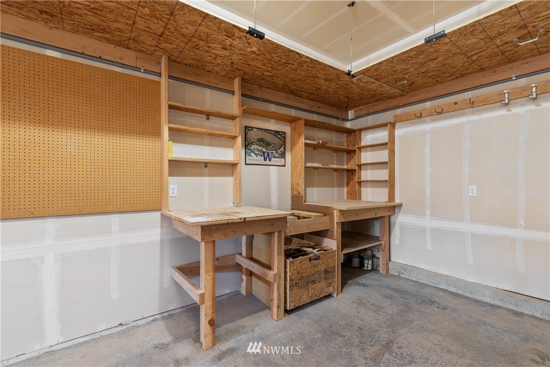 3603 222nd Place Southeast Bothell, WA 98021 - Photo 19 of 40 a room with a table and windows